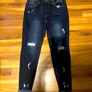 Two pairs of KanCan jeans- one with tags size 31 asking price is for one pair.